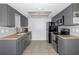 Updated kitchen with stainless steel appliances and ample counter space at 8443 Sw 109Th Place, Ocala, FL 34481