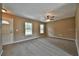 Cozy living room features neutral walls, soft carpeting, and bright natural light at 89 Fisher Way Crse, Ocklawaha, FL 32179