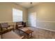 This bonus room has carpet, a window, and room to relax at 8950 Se 17Th Ct, Ocala, FL 34480