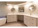 This bathroom features a white vanity, marble countertop, and a soaking tub at 8950 Se 17Th Ct, Ocala, FL 34480