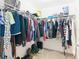 Walk-in closet with wire shelving, providing ample storage space for clothing and accessories at 9525 Sw 200 Ct, Dunnellon, FL 34431