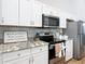 A kitchen featuring stainless steel appliances and decor at 9525 Sw 200 Ct, Dunnellon, FL 34431