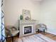 Sitting room with an electric fireplace and comfortable seating, creating a cozy atmosphere at 9525 Sw 200 Ct, Dunnellon, FL 34431