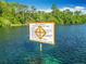 Clear view of the Aquatic Preserve with signs for Rainbow Springs State Park, showcasing swimming and safety info at 9525 Sw 200 Ct, Dunnellon, FL 34431