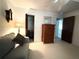 Cozy bedroom boasts a closet, dresser, and ceiling fan at 9711 Sw 196Th Cir, Dunnellon, FL 34432