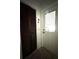 Entryway featuring a closet and white front door with window, offering convenient access at 9711 Sw 196Th Cir, Dunnellon, FL 34432