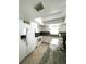 Bright kitchen featuring stainless steel appliances and light countertops at 9711 Sw 196Th Cir, Dunnellon, FL 34432