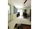 Versatile living space with door to the outside, neutral carpet and furniture at 9711 Sw 196Th Cir, Dunnellon, FL 34432