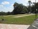 Community recreational area with bocce ball courts and covered picnic areas for outdoor enjoyment at 9711 Sw 196Th Cir, Dunnellon, FL 34432