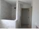 Stylish bathroom featuring a walk-in shower with decorative subway tile at 10409 Sw 45 St, Ocala, FL 34481