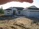 Inviting single-story home with a three-car garage and stone accents at 10409 Sw 45 St, Ocala, FL 34481