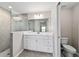 Modern bathroom with a sleek vanity, a tiled shower area, and neutral tones for a spa-like feel in this relaxing space at 10426 Sw 133Rd Ave, Dunnellon, FL 34434