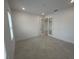 Bedroom featuring large windows and french doors at 10530 Sw 98Th Pl, Ocala, FL 34481