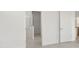 An open bedroom view showing a walk-in closet and bathroom at 10530 Sw 98Th Pl, Ocala, FL 34481