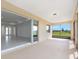 Inviting screened-in patio seamlessly connects indoor and outdoor spaces, enhancing the home's living experience at 10530 Sw 98Th Pl, Ocala, FL 34481