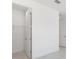 A walk-in closet featuring white wire shelving at 10530 Sw 98Th Pl, Ocala, FL 34481
