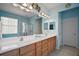 Spacious Primary bathroom featuring a double vanity, garden tub, and separate shower at 12165 Se 91St Ave, Summerfield, FL 34491