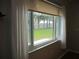 Views of backyard and fencing through large window at 13816 Sw 112Th Ter, Dunnellon, FL 34432