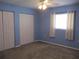 Bedroom with bi-fold closet doors, ceiling fan and window at 13816 Sw 112Th Ter, Dunnellon, FL 34432