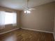 Bedroom with neutral paint, window with blinds, and ceiling fan at 13816 Sw 112Th Ter, Dunnellon, FL 34432