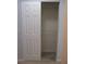 Bedroom closet featuring shelving and wood look vinyl flooring at 13816 Sw 112Th Ter, Dunnellon, FL 34432