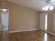The living room features laminate flooring and neutral paint at 13816 Sw 112Th Ter, Dunnellon, FL 34432