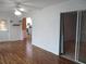 Open living space featuring hardwood floors and sliding door to the backyard at 13816 Sw 112Th Ter, Dunnellon, FL 34432