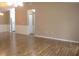 Spacious living room boasts laminate flooring and easy access to the kitchen at 13816 Sw 112Th Ter, Dunnellon, FL 34432