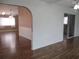 Spacious living area featuring beautiful hardwood floors and an open floor plan at 13816 Sw 112Th Ter, Dunnellon, FL 34432