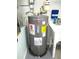 Rheem Performance Plus water heater near utility sink at 13816 Sw 112Th Ter, Dunnellon, FL 34432