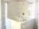 Bathroom featuring a walk-in tub and safety bars at 14272 Sw 112Th Cir, Dunnellon, FL 34432