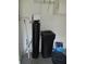 The image showcases a water softener system installed inside the property, promoting enhanced water quality at 14272 Sw 112Th Cir, Dunnellon, FL 34432