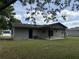 Spacious backyard with a covered patio, perfect for outdoor entertaining at 15036 Sw 35Th Cir, Ocala, FL 34473