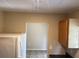 Bright kitchen with white appliances and tile floors at 15036 Sw 35Th Cir, Ocala, FL 34473