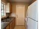 Functional kitchen with essential appliances and ample cabinet space, ready for culinary adventures at 15036 Sw 35Th Cir, Ocala, FL 34473