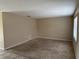 The living room boasts plush carpeting and abundant light, ready for relaxation and comfort at 15036 Sw 35Th Cir, Ocala, FL 34473