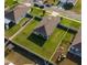Aerial view of a beautiful home with a large, fenced backyard, perfect for outdoor activities at 1509 Ne 50Th Ter, Ocala, FL 34470