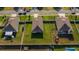 A bird's eye view of a Gathering home with privacy fence, a big yard, and a quiet street at 1509 Ne 50Th Ter, Ocala, FL 34470