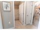 Bright bathroom with white fixtures and tiled floor at 1509 Ne 50Th Ter, Ocala, FL 34470