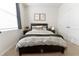 Inviting bedroom with plush bedding and natural light at 1509 Ne 50Th Ter, Ocala, FL 34470