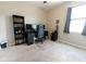 Bedroom with modern style includes neutral walls and plush carpet and a ceiling fan at 1509 Ne 50Th Ter, Ocala, FL 34470