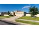 Beautiful single-story home with a two car garage, well-maintained landscaping, and inviting curb appeal at 1509 Ne 50Th Ter, Ocala, FL 34470