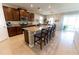 Spacious kitchen featuring granite countertops, stainless steel appliances, and a large island with seating at 1509 Ne 50Th Ter, Ocala, FL 34470