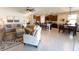 Open-concept living area seamlessly connects the living room, kitchen, and dining, with comfortable seating at 1509 Ne 50Th Ter, Ocala, FL 34470
