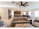 Spacious living room showcasing an open floor plan with comfortable furnishings, and connection to kitchen at 1509 Ne 50Th Ter, Ocala, FL 34470