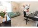 Cozy home office with comfortable seating and a functional desk area at 1509 Ne 50Th Ter, Ocala, FL 34470