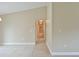 Image features a hallway with neutral colored walls and carpeted floors at 16219 Sw 48Th Cir, Ocala, FL 34473