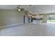 Open concept kitchen featuring stainless steel appliances, island, and white cabinets at 16219 Sw 48Th Cir, Ocala, FL 34473