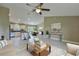 Open-concept living space connecting living room, kitchen, and dining area, great for gatherings at 16219 Sw 48Th Cir, Ocala, FL 34473