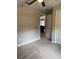 Bedroom featuring carpeted floors and open doorway at 20386 Sw 95Th St, Dunnellon, FL 34431